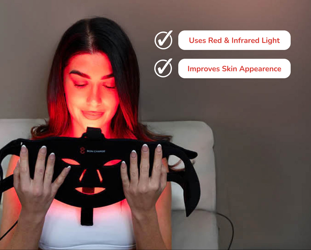 Red Light Benefits Next To Woman Holding A Face Mask